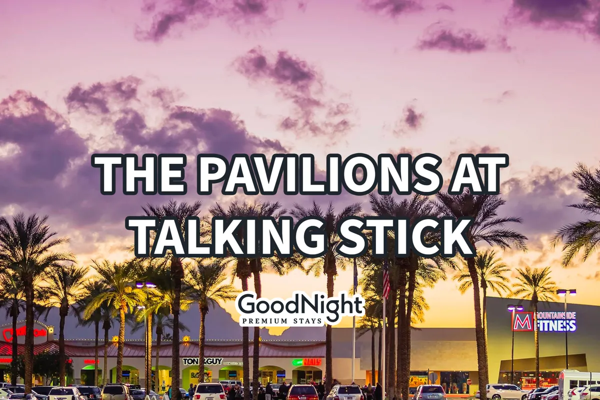 A lively streetscape with palm trees, vibrant storefront signage, and a colorful sky, suggesting local shopping, dining, and community gathering opportunities just a short walk away.